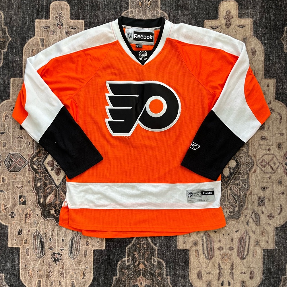 Vintage Reebok Philadelphia Flyers Orange and Black NHL Jersey